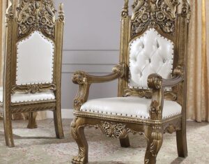 Premium 12-seater dining tables designed for luxury homes with handcarved detailing.